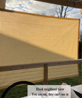Installing 90 Percent UV Blocking Shade Cloth for Patio and Outdoor Spaces 8x20 Ft Pergola Sun Shade Cover on a wooden deck.
