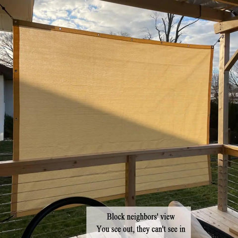 Installing 90 Percent UV Blocking Shade Cloth for Patio and Outdoor Spaces 8x20 Ft Pergola Sun Shade Cover on a wooden deck.