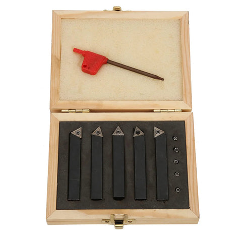 Front view: five 3/8in indexable turning tools with carbide inserts in a wooden storage box.