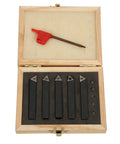 Front view: five 3/8-inch indexable turning tools with carbide inserts in a wooden box.