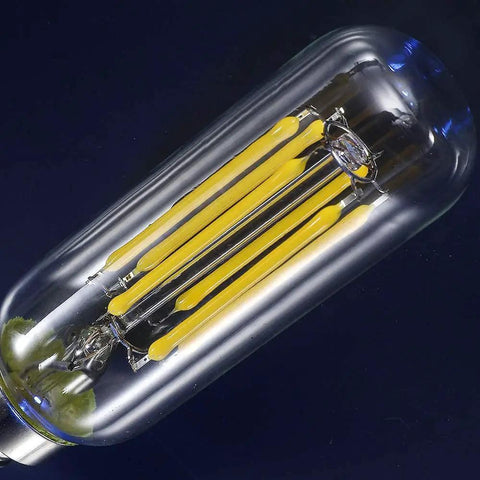 Close-up of Dimmable LED Filament Candle Bulb 60W Equivalent For Chandeliers And Sconces 4000K Daylight White Clear Glass