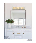 Crystal Vanity Light Four Light Gold Bathroom Fixture With G9 Bulb Compatibility above mirror in modern bathroom setting