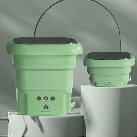 Ultra Portable Folding Washing Machine in green, compact size with control panel, suitable for travel and small spaces.