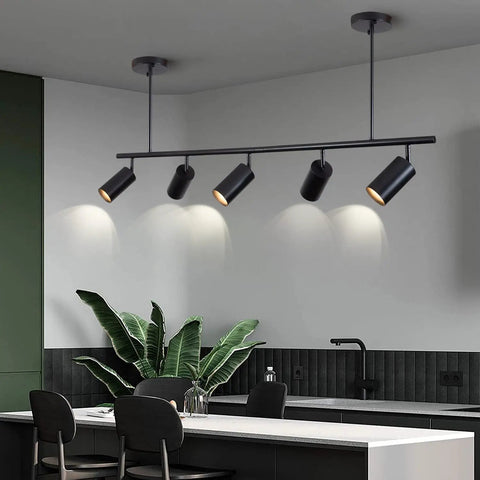 5 Light LED Track Lighting Kit in Black with Flexible Rotatable Heads over modern kitchen island