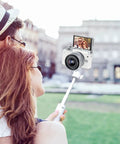 Couple using MT-08 White Mini Tripod For Camera With 1 Quarter Inch Mount 2 In 1 Extendable Handheld Video Stand for selfies