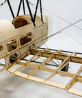Close-up of 39 Inch Mini Tiger Moth Balsa Wood RC Airplane Kit With Laser Cut Parts showing unassembled frame structure