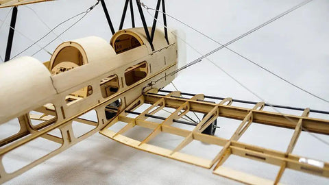 Close-up of 39 Inch Mini Tiger Moth Balsa Wood RC Airplane Kit With Laser Cut Parts showing unassembled frame structure
