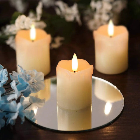 Flameless Votive Candles With Timer Real Wax 2 By 2 Battery Operated 6 Pack displayed on a mirror with flowers