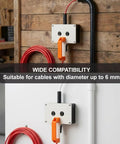 Compact Drill Powered Wire Puller Featuring Slick Conduit Fish Tape Grip on wall, suitable for cables up to 6mm in diameter.
