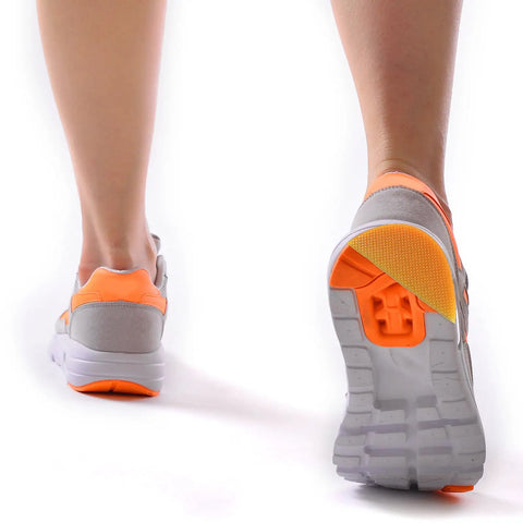 Runner wearing sneakers with Bevel Design Rubber Heel Patch Kit For Shoes With Anti Slip Patches 2 Pairs Heel Lifts installed.