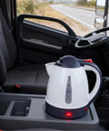 12V Car Electric Kettle With Auto Shut Off Portable Water Heater For Long Distance Runs And Weekend Getaways on vehicle center console.