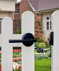 Double Sided Gate Latch for Wooden Fence And Wood Gate Heavy Duty Swinging Door Latch installed on white fence near garden