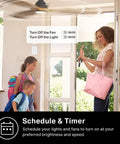 Woman using smartphone near door with Smart Ceiling Fan Controller And Dimmer Switch for Easy Breeze And Lit Ambiance visible.