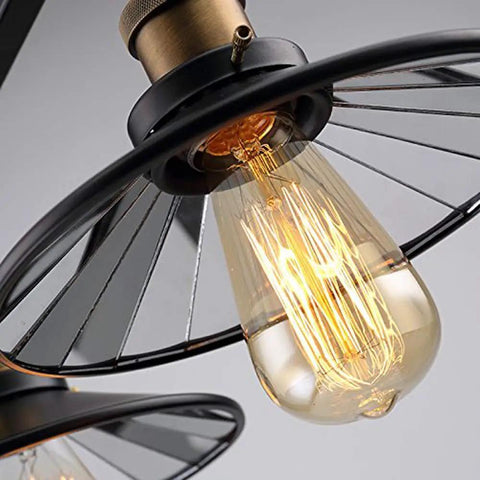 Close-up of bulb in Industrial Vintage 3 Light Semi Flush Ceiling Mount Fixture, retro metal design, black finish.