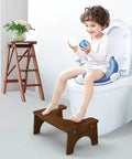 Child using Wooden Toilet Stool For Kids And Adults, Anti Slip Bamboo Potty Training Step Stool, 7 Inch Rise, on toilet