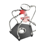 Welding Soldering Magnifier With Flexible Gooseneck Arms And 360 Degree Rotating Alligator Clips, Pro Grade Handy Helping Hands For Precision PCB Work At Your Desktop Station, showing a PCB board in clips.