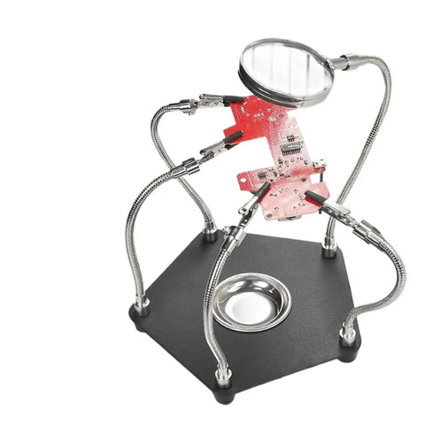 Welding Soldering Magnifier With Flexible Gooseneck Arms And 360 Degree Rotating Alligator Clips, Pro Grade Handy Helping Hands For Precision PCB Work At Your Desktop Station, showing a PCB board in clips.