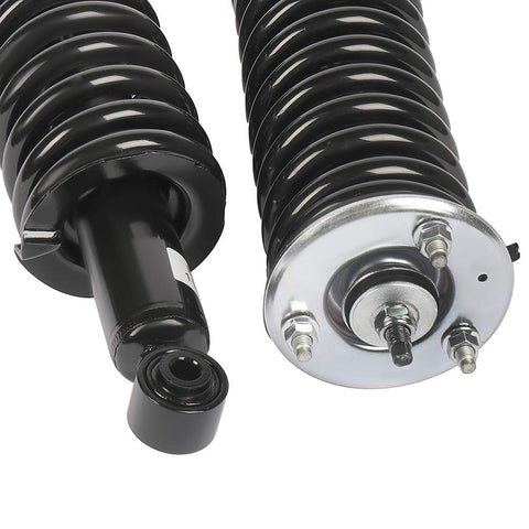 Close-up of Complete Strut Spring Assembly Shock Absorber For Nissan Frontier 2005 To 2014 Front And Rear Pair Set Of 4 Built For A Smooth Ride And Easy Install For DIY Enthusiasts No Hassle showing coil and mounting details