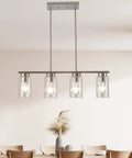 Farmhouse Style 4 Light Dining Room Fixture With Clear Glass Shades And Brushed Nickel Finish For Kitchen Island And Dining Table Lighting Upgrade Perfect For Dining Room And Kitchen Island Ambience With Easy Ceiling Mount above wooden dining chairs.