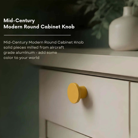 Get Those Mid Century Modern Vibes Going With This Solid Aluminum Cabinet Knob. Sunflower yellow round knob on cabinet.