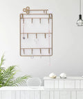 Heavy Duty Iron Wall Coat Rack With Eleven Sick And Sturdy Key And Bag Hooks For Front Door Organization Hat Towel Purse Storage Setup, mounted on wall.