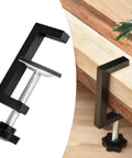 Rock Solid Reversible C Clamp For Woodworking And Plastic Projects 10 To 57mm showing black metal fixture holding wood securely.