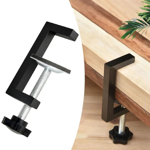 Rock Solid Reversible C Clamp For Woodworking And Plastic Projects 10 To 57mm showing black metal fixture holding wood securely.