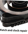 Close-up of metal spring from Pro Grade Mechanical Alarm Clock Repair Kit With Precision Springs and Winding Key Assembly.