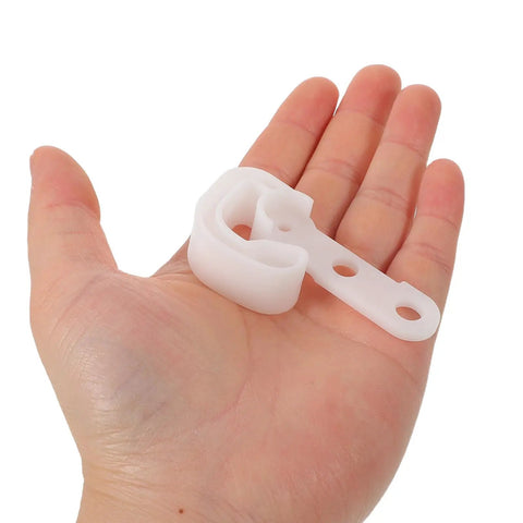Premium White Refrigerator Door Stopper Replaces Latch Hook And Hinge Catch Clip For Smooth Appliance Operation With Streamlined Compact Fit To Prevent Freezer Swing in hand.