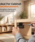 Installing Beefy Black Angle Furniture Corner Bracket on wooden cabinet for reinforcement.