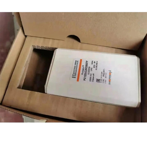 Beefy High Voltage Fuse For Semiconductor Circuits Offering 2000 Volt 500 Amp Thermal Breaker Switch And Rock Solid Electrical Surge Protection For Pro Builds And Daily Drivers in a cardboard box.