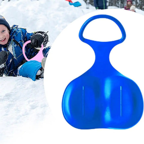 Child playing in snow with Snow Sled Toboggan for Kids and Adults, Cold-Resistant PP Build With Comfy Handles, Blue.