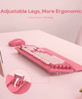 Side view of Hot Pink Typewriter Style Wireless Keyboard And Mouse Combo with adjustable tilt legs and magnetic wrist rest.