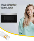 Woman smiling next to microwave with 3W LED Microwave Light Bulb Replacement 120V Warm White 3000K 300 Lumen Output, easy installation