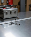 Adjustable Stainless Steel Toggle Latch Clamps with toolbox and ruler on a workshop table