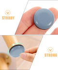 20 Pack Heavy Duty Kitchen Appliance Sliders For Washing Machine And Microwave With Self Adhesive Backing close-up of blue slider on hardwood.