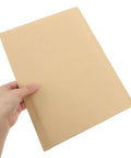Hand holding 20 Pack Kraft Paper Bubble Mailers With Self Sealing Design And Shockproof Padding, Large Padded Envelopes, 22x34cm