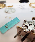 Timepiece Cleaning Putty For Watches Pro Grade Dry Clay Bar with watch movement parts on a workstation.