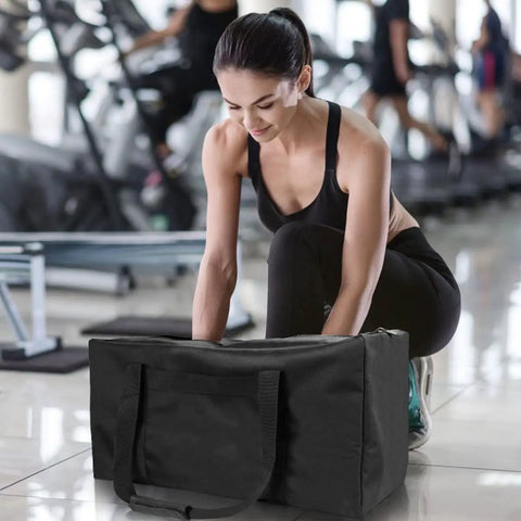 Person with Beefy 56L 24Inch Sports Duffel Bag Set With Upgraded Zipper Water Resistant Foldable Gear Tote in gym setting