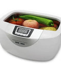 2.5 Liter Capacity Ultrasonic Jewelry Cleaner With Digital Timer And 40 Khz Frequency For Rings Watches Coins And Glasses filled with fruits in water