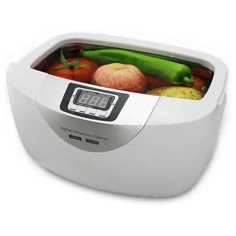 2.5 Liter Capacity Ultrasonic Jewelry Cleaner With Digital Timer And 40 Khz Frequency For Rings Watches Coins And Glasses filled with fruits in water