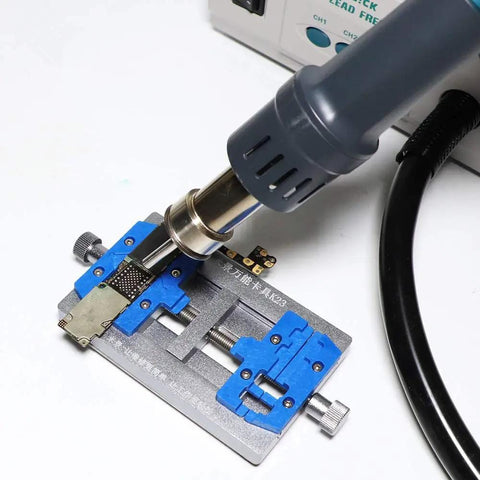 861DW 1000W Hot Air Rework Station with 3 nozzles in use on PCB for phone chip repair, showing precise desoldering process.