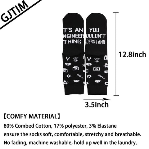 Black socks with 'It's An Engineer Thing You Wouldn't Understand' text, images of tools, 12.8x3.5 inch size, cotton blend.