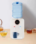 No Fuss Countertop Water Dispenser With Hot And Cold Water, top loading with white finish, fits 1.19 to 4.99 gallon bottles.