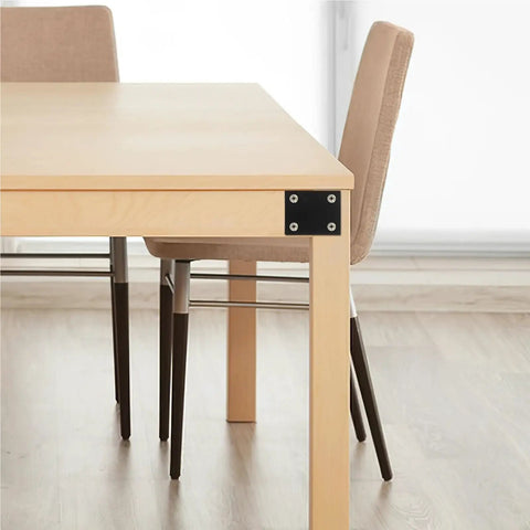 Thirty Pack Stainless Steel Mending Plates And Right Angle Corner Braces For Tough Furniture Repairs and Cabinet Reinforcements With Pre Drilled Holes For Fast No Sweat Wall Mounting on table corner.
