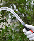 Two Piece Japanese Style Garden Sickle Set With Steel Hand Sickles For Weeding And Lawn Care, 3.7 Inch Blades in use outdoors