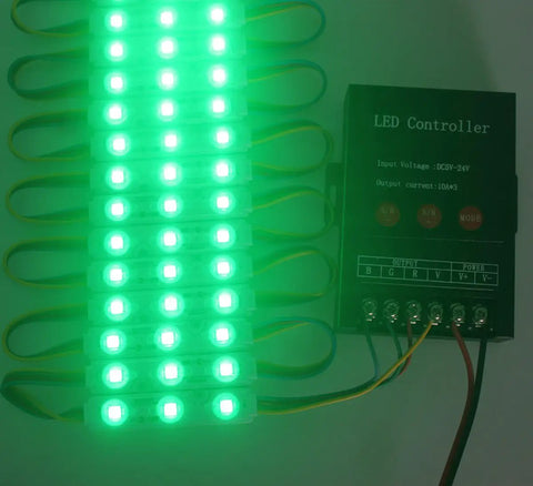 200 Pack 12V RGB 5050 LED Module Lights With Three LED Emitters, Waterproof Peel And Stick Backing, glowing green with controller