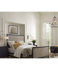Bedroom with Kempsey Collection One-Light Swing Arm Wall Bracket Nickel Finish sconce above bed
