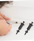 Person installing 4 Sets Sliding Barn Door Hardware Spacers And Track Connectors Carbon Steel Adjustable Wall Mounted on wall