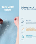 12 Inch Wide Bubble Cushioning Wrap Roll For Packing And Moving, hands tearing at perforation, clear wrap, blue background